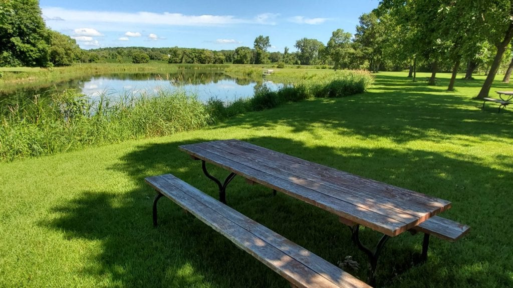 picnic tables near riverside picnic shelter phelps mill county park